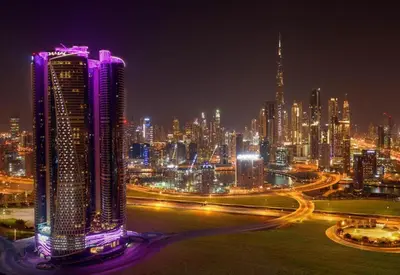 a night view of a large city at night at PARAMOUNT TOWER B BUSINESS Bay Lux 1 bedroom Apt in Dubai