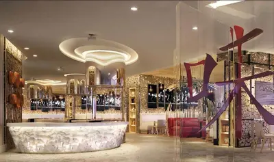 a wine store with a large display of wine bottles at PARAMOUNT TOWER B BUSINESS Bay Lux 1 bedroom Apt in Dubai