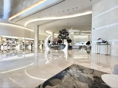 a large lobby with a store with flowers on display at Vogue Marina JW Marriott with Direct Access to Marina Mall, Studio Apartment with Balcony and Marina Skyline View, Access to all Amenities in Dubai