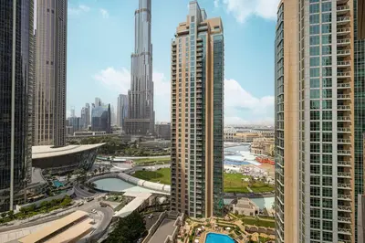 a view of a city with many tall buildings at Act 1 Act 2 Towers, Luxury 4BR, Full Burj Khalifa View Balcony, Pool, Gym in Dubai