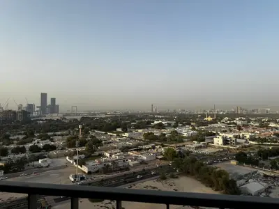 a view of a city from the top of a building at 2min Walk to Dubai Mall - 2BR - Infinity Pool & Gym - Burj Khalifa in Dubai