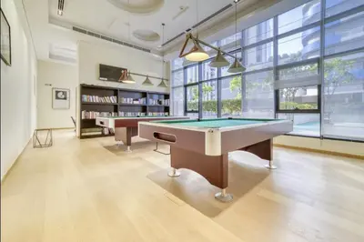 a large room with a pool table in it at Luxe 1BR in RP Heights Downtown - 50mt to Dubai Mall, walk to Burj Khalifa and Fountain in Dubai