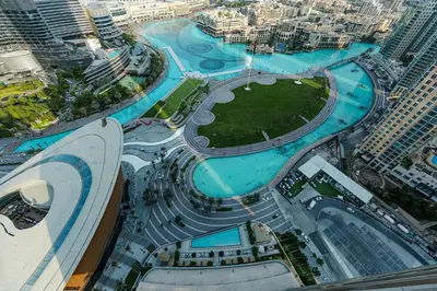 an aerial view of a city with a pool at Bitcoin Moonrise 2BR - Grande Burj Views in Dubai