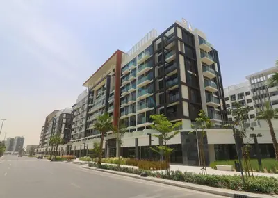 a rendering of a building on a street at Peaceful 1BR with Community View, Quick Downtown and Golf Club Access, Azizi Riviera 34, Al Merkadh by Deluxe Holiday Homes in Dubai