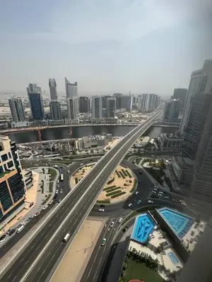 an overhead view of a busy highway in a city at Dubai Downtown Canal View Studio 2306 in Dubai