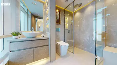 a bathroom with a shower and a sink and a toilet at bnbmehomes - The Lofts Central in Dubai
