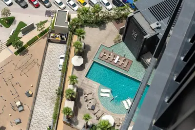 an overhead view of a swimming pool in a building at Urban Studio - Business Bay in Dubai