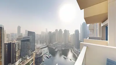 a view of a river in a city with buildings at One Bed Marina View on 34th floor in Dubai