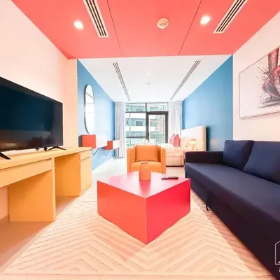 Colorful Studio with Balcony & City Views
