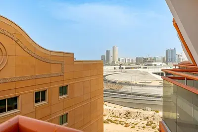 a view of a city from a building at Sunny Studio with Pool, Near Silicon Central Mall in Dubai