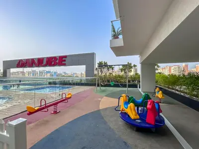 an image of a playground at a mall at stylish 1BR Pearlz Pool & Gym Near Metro in Dubai
