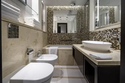 a bathroom with a white toilet and a sink at A&S Downtown Dubai in Dubai