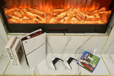 a counter top with a oven with a rack of food at Luxury Apt 2BR with full burj khalifa view in Dubai