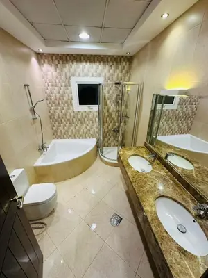 a bathroom with two sinks and a tub and a toilet at Dubai Al Barsha Villa Fully Furnished Luxury Private Master Room Ensuite Huge Space Deluxe in Dubai