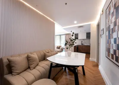 a living room with a couch and a table at Modern 2-BR in 8-BLVD WALK Downtown Dubai in Dubai