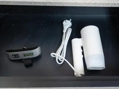 a box with a nintendo wii game system and a wii controller at 64th Floor Infinity Pool 2BR Best Burj Khalifa View in Dubai