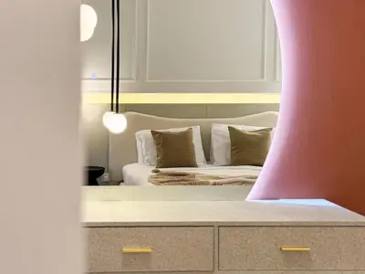 a bedroom with a bed in a mirror at 64th Floor Infinity Pool 2BR Best Burj Khalifa View in Dubai