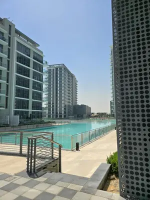 a large swimming pool in a city with tall buildings at DAYF-JFH Spacious Apartment 4 PAX with Magical Lagoon Views in Dubai