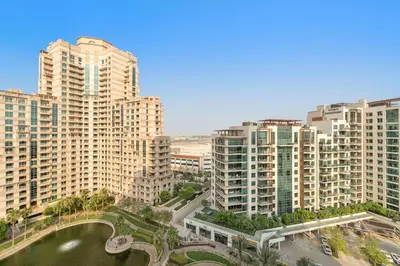 an aerial view of a city with tall buildings at FIRST CLASS 1BR Modern Urban Retreat in Dubai