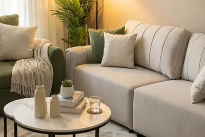 a living room with a couch and a table at Vida Dubai Mall! Excellent Amenities! Direct Access To Dubai Mall in Dubai