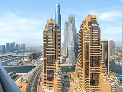 a view of a large city with tall buildings at Bright & Stylish Studio with Marina Views in Dubai