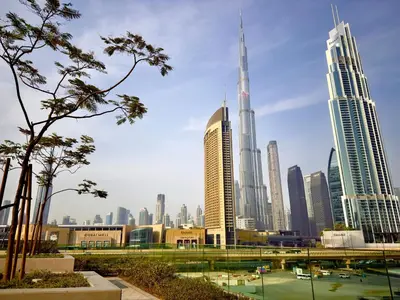 a view of a city with tall buildings at Burj Khalifa View Luxe 2BR x Connected to Dubai Mall in Dubai