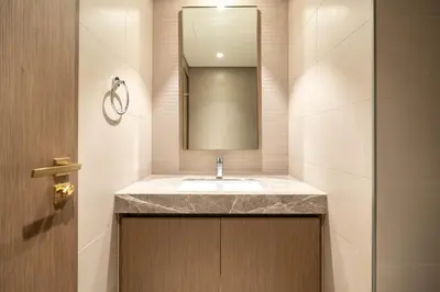 a bathroom with a sink and a mirror at KeyRock - Palm & Sea View Apt at Grand Bleu in Dubai