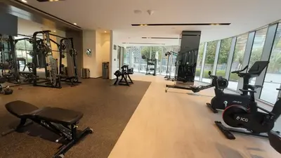 a gym with treadmills and exercise equipment in a building at Luxe 1 Bedroom with High Floor close to Dubai Mall in Dubai