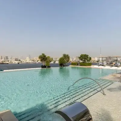 Iconic 3BHK I Stunning Creek Views I Sleep up to 6 guests I High Floor I Pool I Free Parking I Pet Friendly I