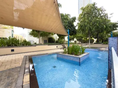 a swimming pool in the middle of a building at GuestReady - Downtown View | 1BR + Sofa Bed in Dubai
