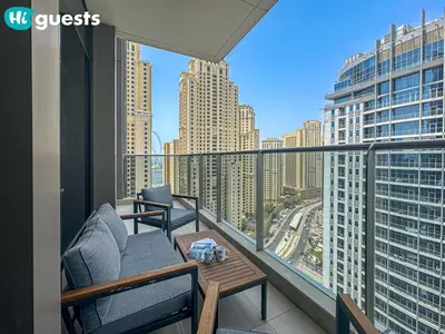 a balcony with a view of a city skyline at HiGuests - Marina View 1 BR with Spacious Balcony in Dubai