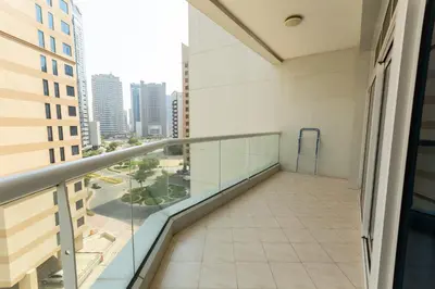 a balcony in a building with a view of the city at Rental Small Rooms for female guest in the heart of Dubai بنات فقط in Dubai