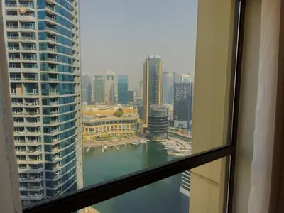 a view from a window of a city at Modern 1BR in JBR, Walk to Beach & Marina in Dubai