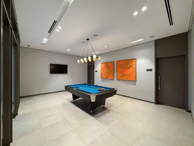 a billiard room with a pool table in it at CitiHome Modern and Cozy Prime Location in Dubai