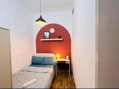 a small room with a bed and a desk at City Edge Room In Barsha Heights Tecom in Dubai