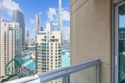 a view of the city from a balcony at Iconic Burj & Fountain View Retreat! in Dubai