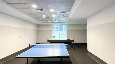 a ping pong room with a ping pong table in it at Luxury 2BR w Floating Bed in Dubai Marina Sulafa 4404 in Dubai