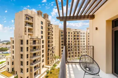 a balcony with a view of tall buildings at FAM Living -Madinat Jumeirah Living Apartment with Iconic Views in Dubai