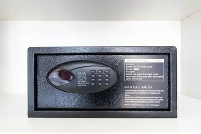 a black remote control in a black picture frame at KeyRock - Palm View Apt with Pool & Gym Access in Dubai