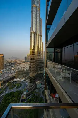 a view of a city with a tall building at Venetian - Sky 3BR - Address Opera with Burj & Fountain views in Dubai
