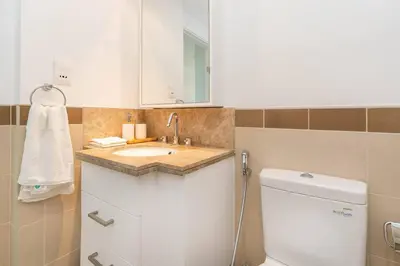 a small bathroom with a sink and a toilet at RBA Holidays - Luxury Studio near Burj Khalifa - Downtown Dubai in Dubai