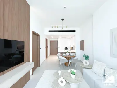 a white living room with a couch and a table at Luxury 1BR l Balcony, Pool, Gym & Prime Location in Dubai