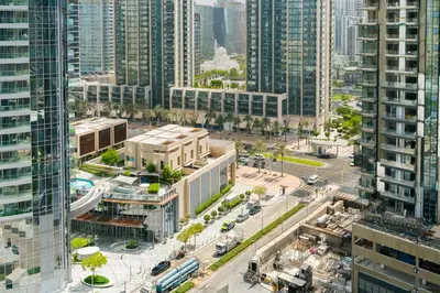 an aerial view of a city with tall buildings at CitiHome Stylish Design Prime Location in Dubai