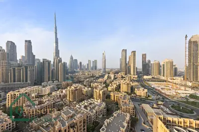 an aerial view of a city with tall buildings at Luxury Stay Skyline Burj View in Dubai
