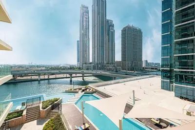 a view of a city skyline with tall buildings at FIRST CLASS 2BR Luxury Canal & Pool Views in Dubai