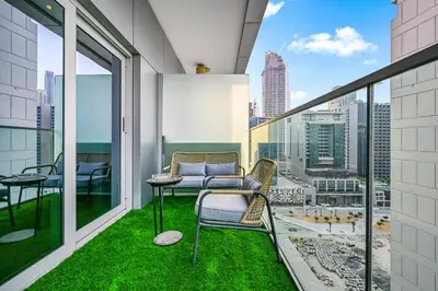 a balcony with a view of a city at Heart of Downtown - Dubai Mall & Burj next door in Dubai