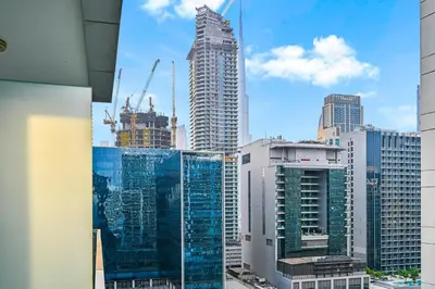 a view of a city skyline with tall buildings at Live in the Center - Walk to Dubai Icons in Dubai