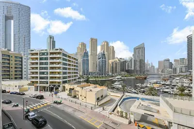a view of a city with tall buildings and a street at Chic Marina View - Timeless Studio Escape in Dubai