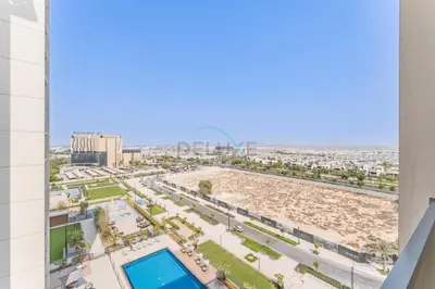 an aerial view of the beach from a building at Steps from Dubai Hills Park, Walk to Dubai Hills Mall, 15-Minute Drive to Burj Khalifa and Dubai Mall, Sway Residences, Dubai Hills by Deluxe Holiday Homes in Dubai