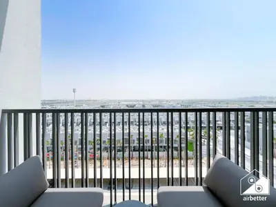 a balcony with a view of a parking lot at Modern Studio Retreat l MAG l Parking & WI-FI in Dubai